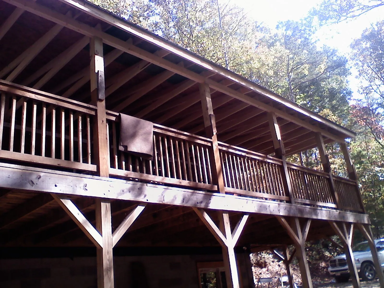 Timber framing under a new elevated porch and deck — Roof Leak Repair in Burket by Roofing Brothers